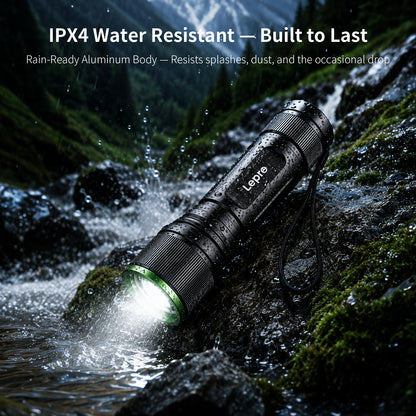 A black Lepro waterproof flashlight with a green accent ring around the illuminated front, shown resting on a mossy rock in a waterfall stream. White text at the top reads 'IPX4 Water Resistant — Built to Last' and 'Rain-Ready Aluminum Body — Resists splashes, dust, and the occasional drop.