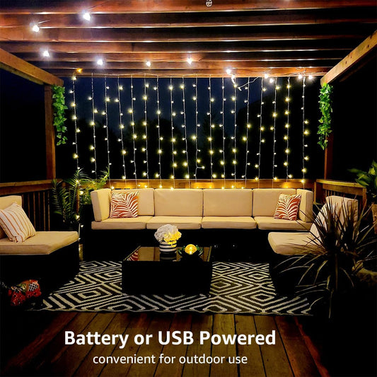LE Curtain Lights Battery Powered, 3m x 3m 300 LED Warm White Fairy Curtain Lights, USB Powered 8 Modes Curtain Fairy Lights for Birthday Decorations, Wedding, Party, Garden, Bedroom, Remote Control